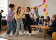 kids dancing and playing games in a house